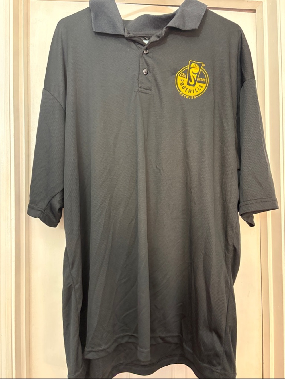 Foothills Brewing Men's Dark Gray Polo Shirt with Yellow Crest
